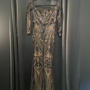 Formal dress medium black sequence dress. Long sleeve off shoulders.